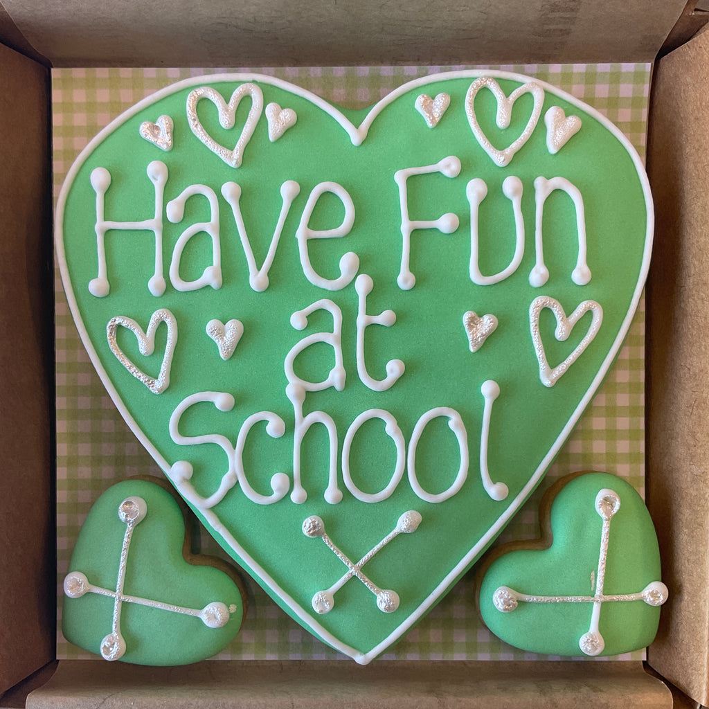 Good luck heart cookie Have fun at school in green icing