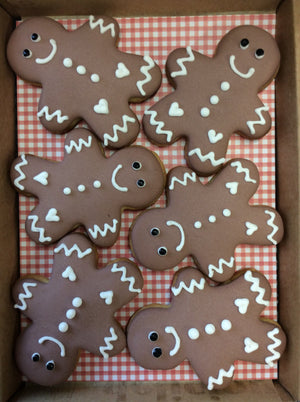 Delicious gingerbread man personalised cookies / biscuits. Table favours for Christmas, cracker gifts. Can have name personalised on each gingerbread man