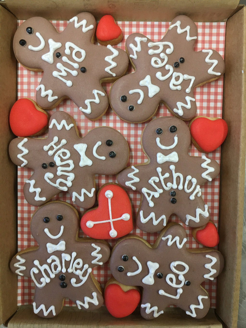 personalised gingerbread man men cookies for Christmas table 