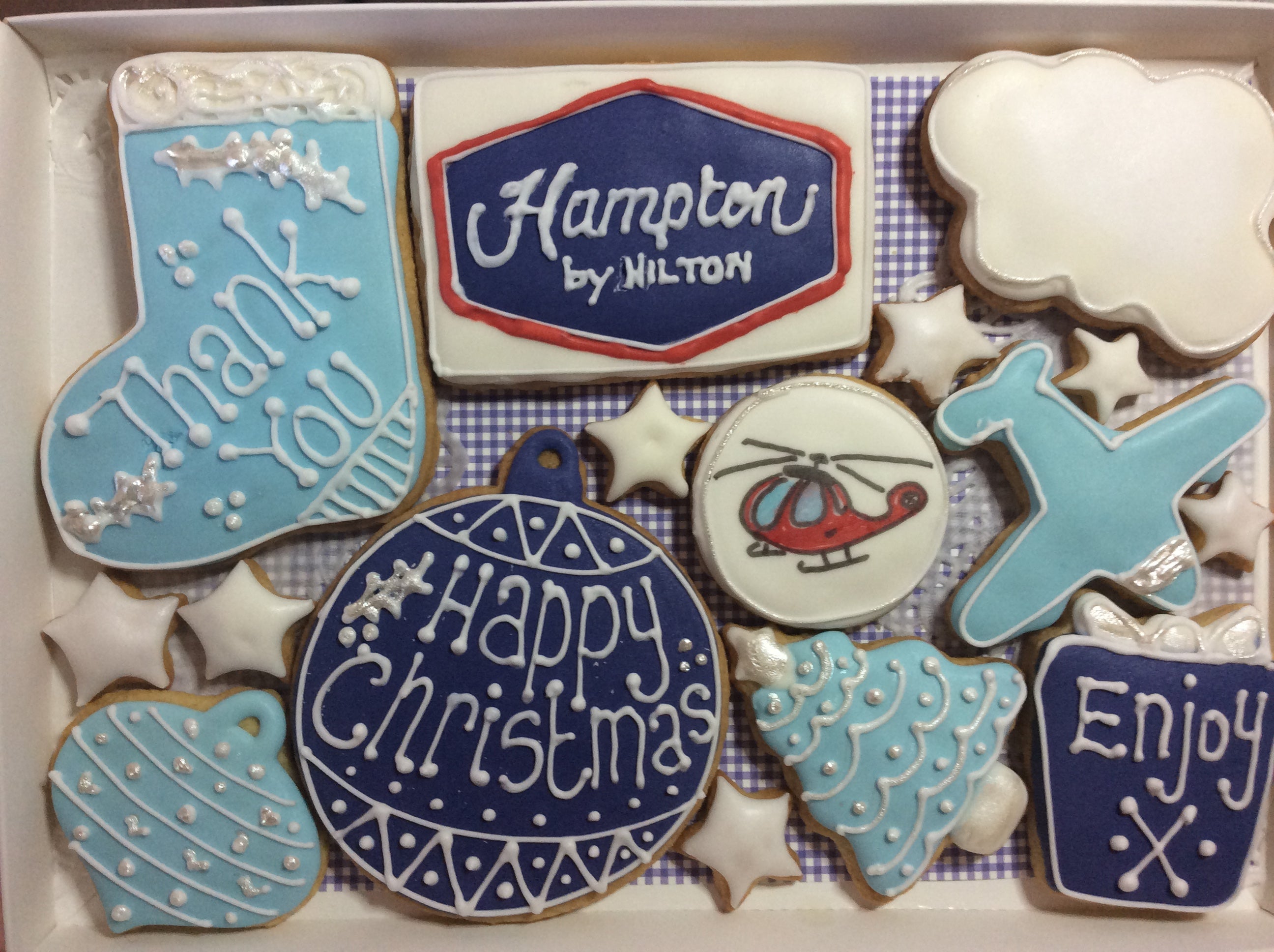 This delicious box of Christmas cookies are personalised with your company logo and words appropriate to your needs. The personalised biscuits can be in multiple colours or single brand colours for your business. Delicious cookie / biscuits treat for customers, suppliers and staff