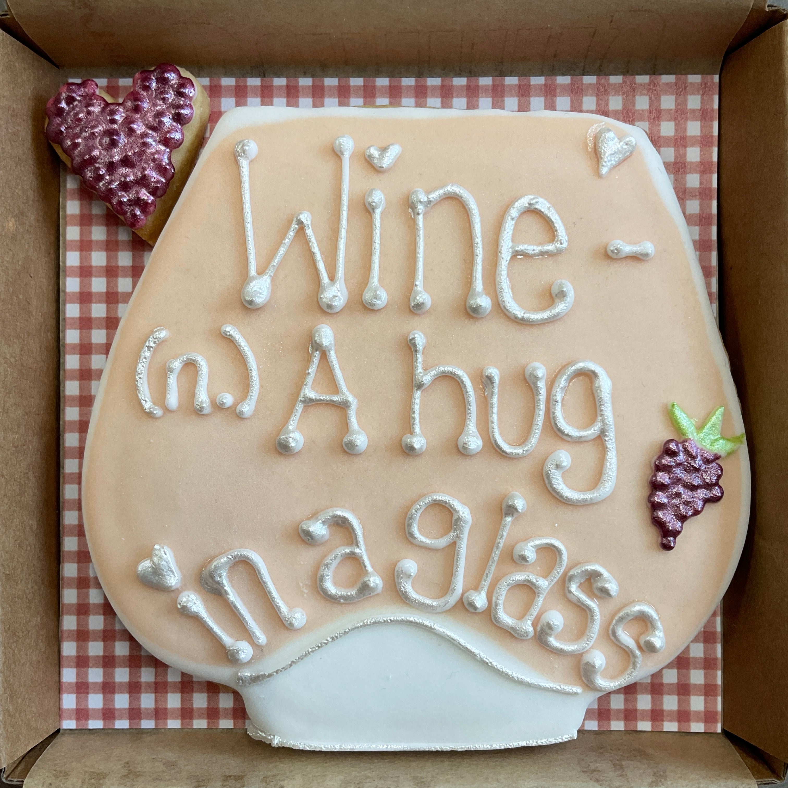 Stemless wine glass biscuit gift. Personalised cookies that go by post. Royal iced biscuits that are letterbox gifts. Delicious biscuits